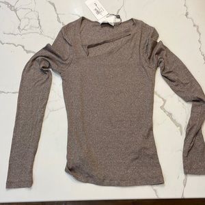 Brand new long sleeve cut out top